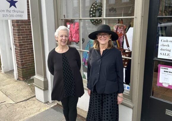 Artisans on the Avenue boutique exterior with colorful awning and artistic window displays