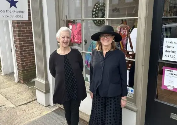 Artisans on the Avenue boutique exterior with colorful awning and artistic window displays
