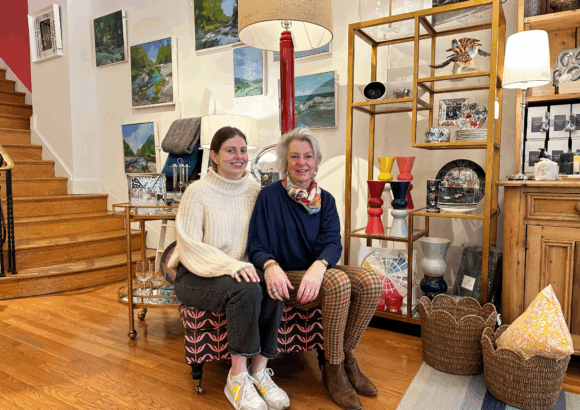 Tailored Home design studio exterior with elegant window displays showcasing home decor and gift items